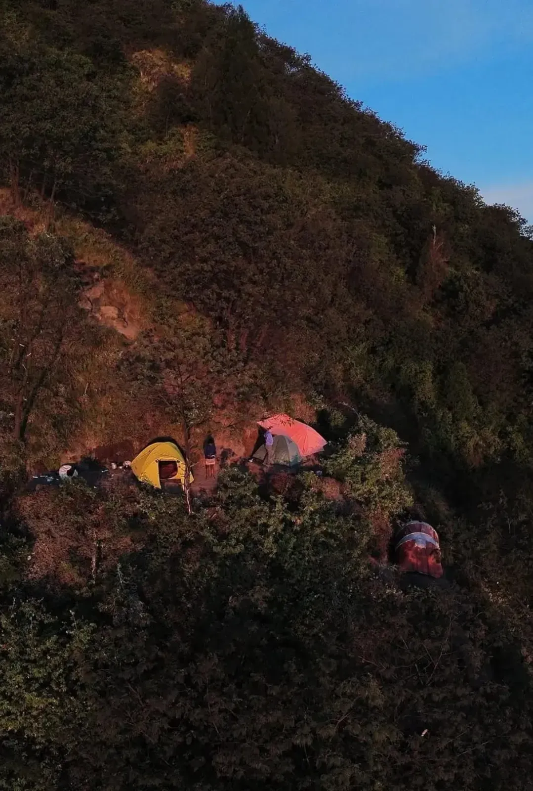 Camping tents on a mountain slope