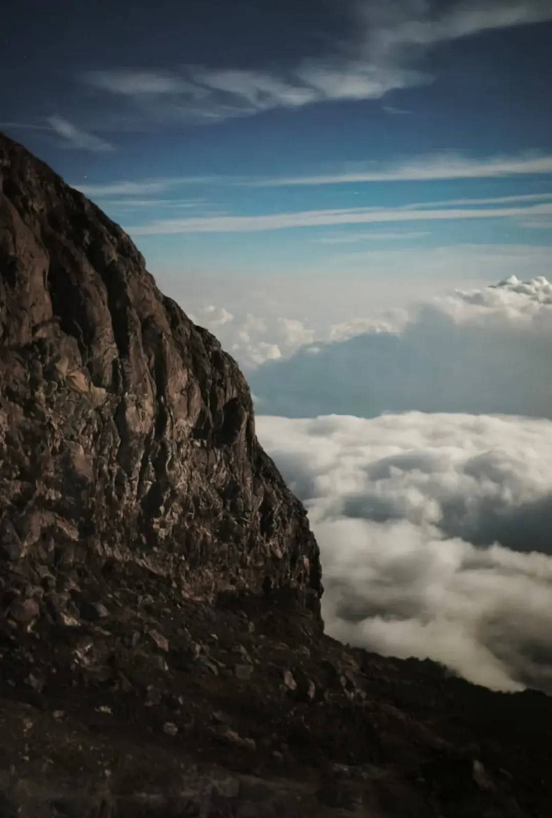 Two mountain routes meeting at a ridge