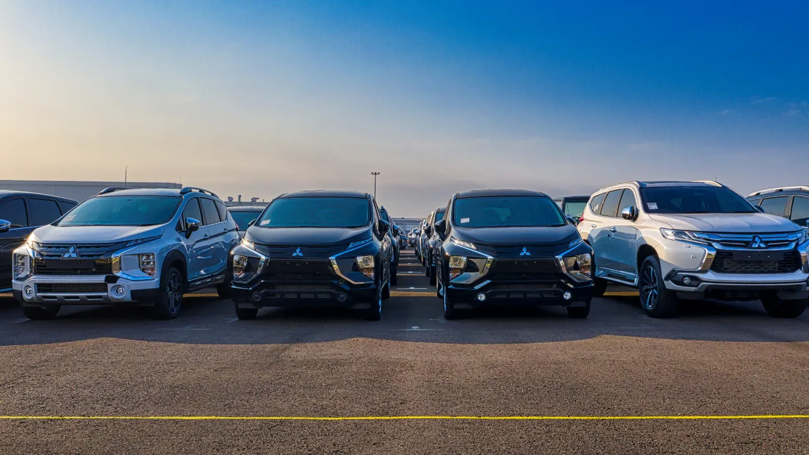 Row of SUVs parked in a lot