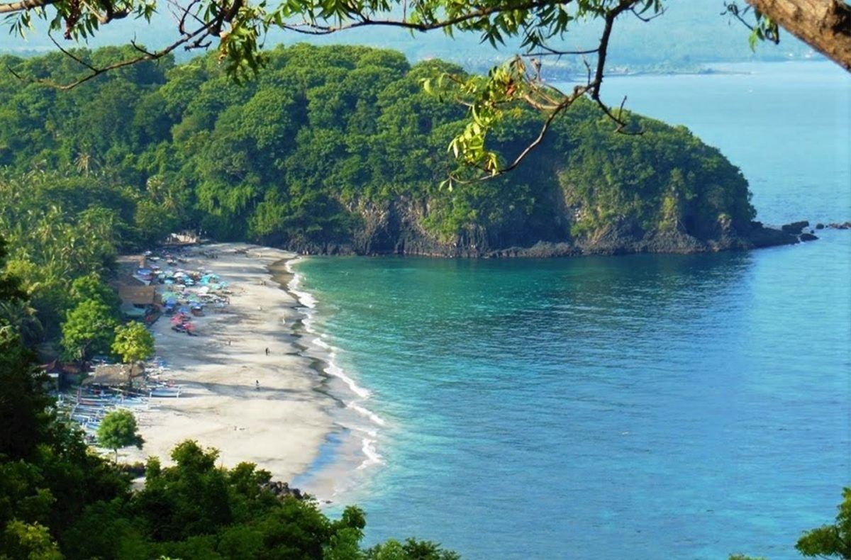 Virgin Beach clear water and quiet white sand in East Bali