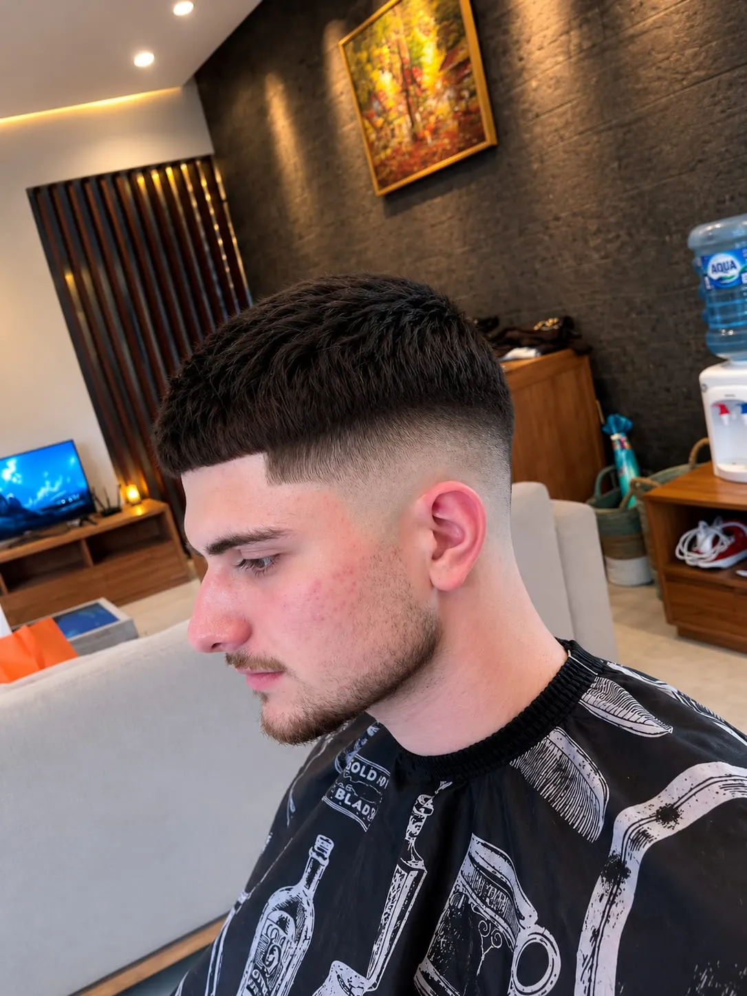 Barber cutting hair