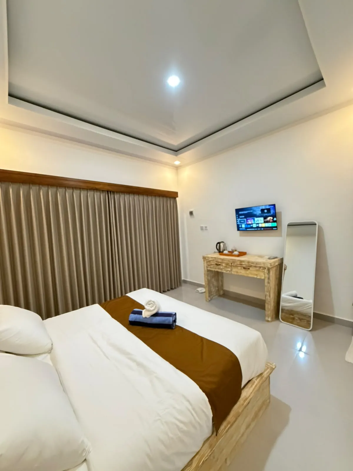 Made bed in a calm room