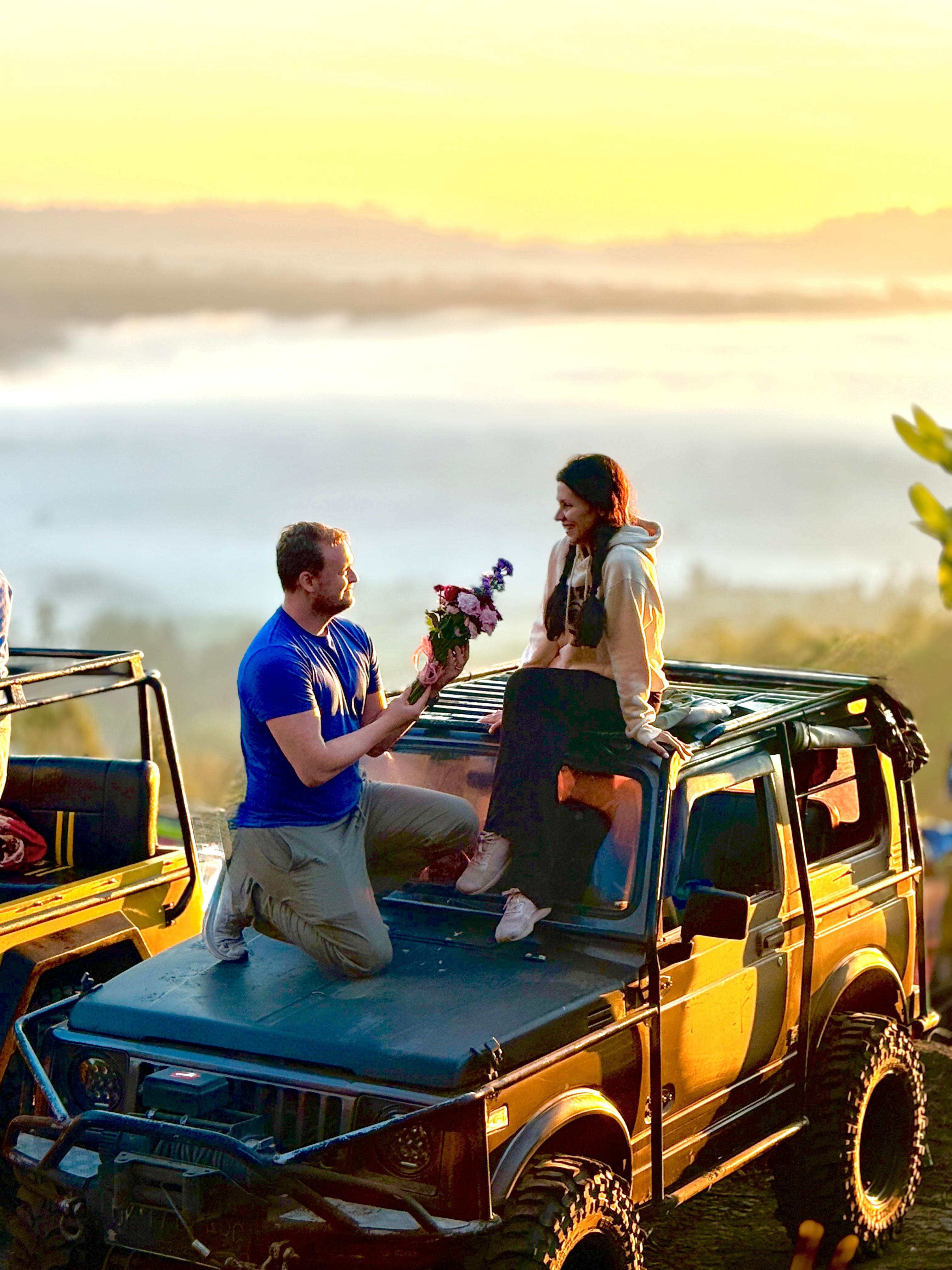 Golden sunrise across volcanic mountains in Bali