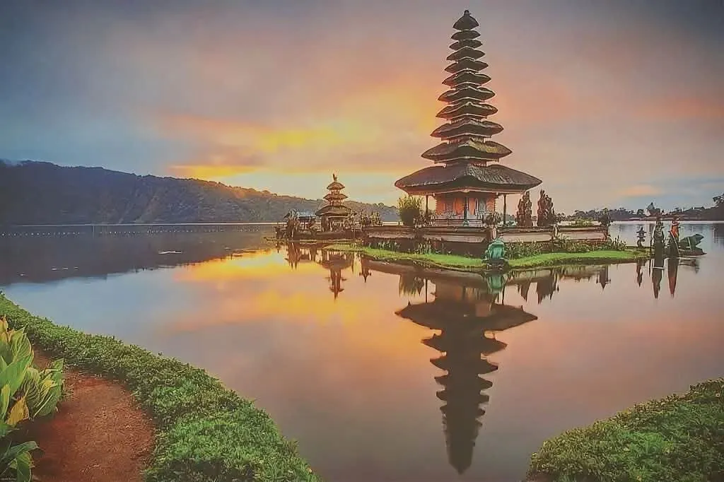 Temple on the water at dusk in Bali