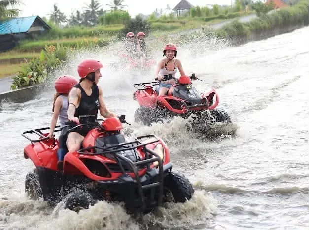 ATV through Bali rice-field water