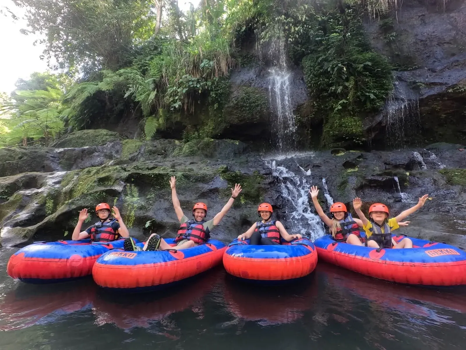 River tubing below a Bali waterfall