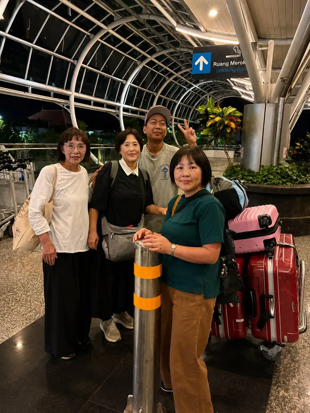 Airport transfer guests at night in Bali