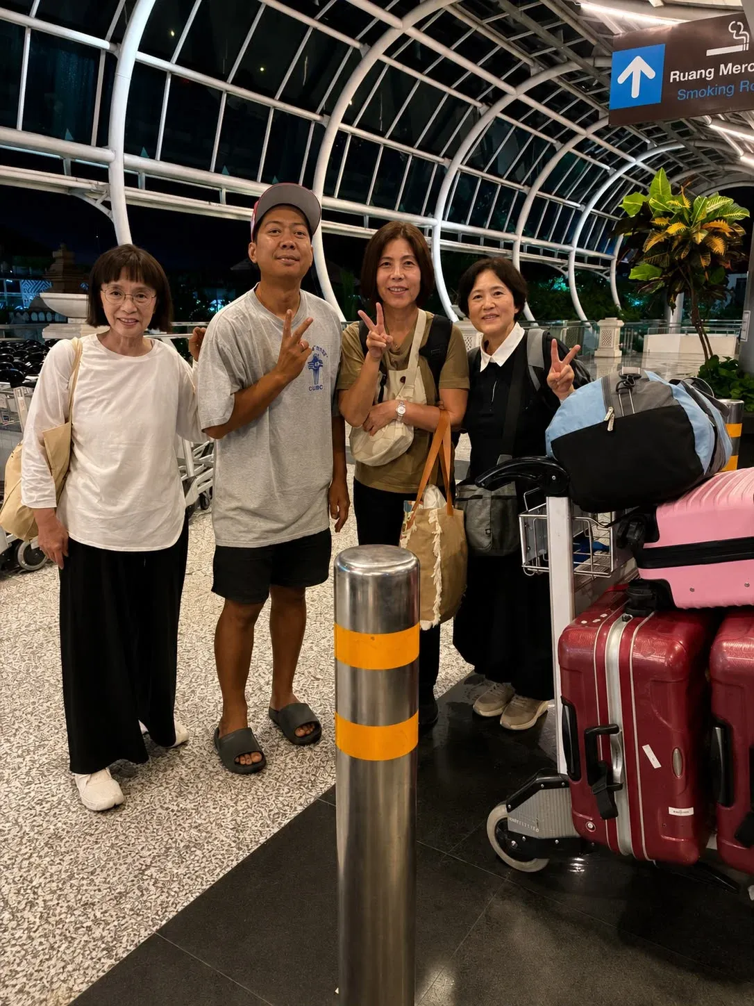 Airport transfer guests with luggage in Bali