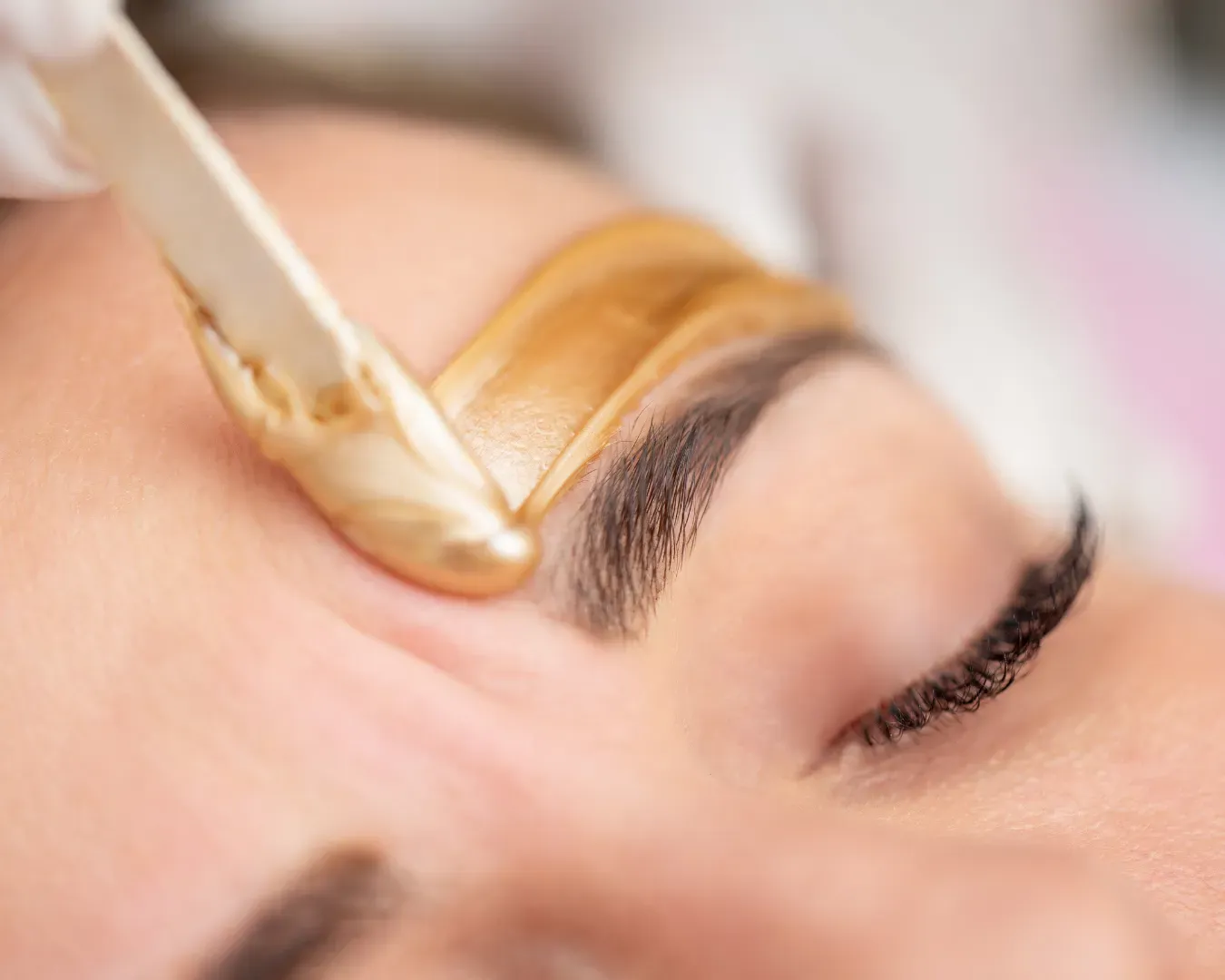 Eyebrow shaping in a beauty studio