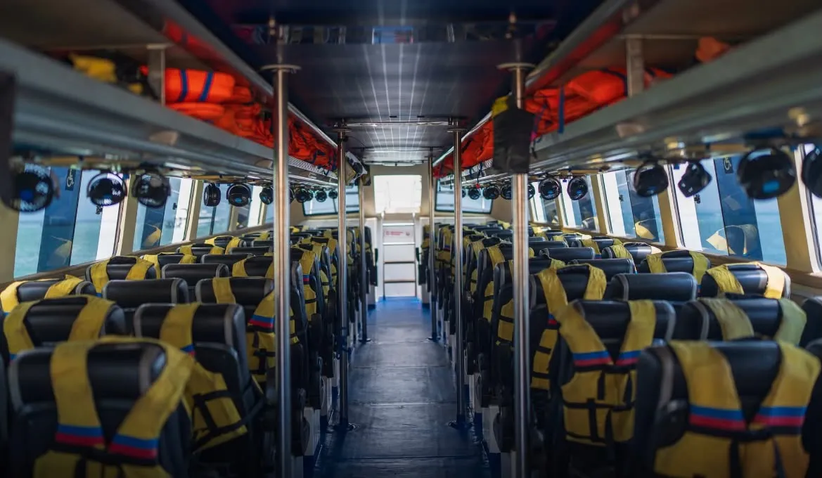 Seats and life jackets inside a fast boat to Nusa Penida