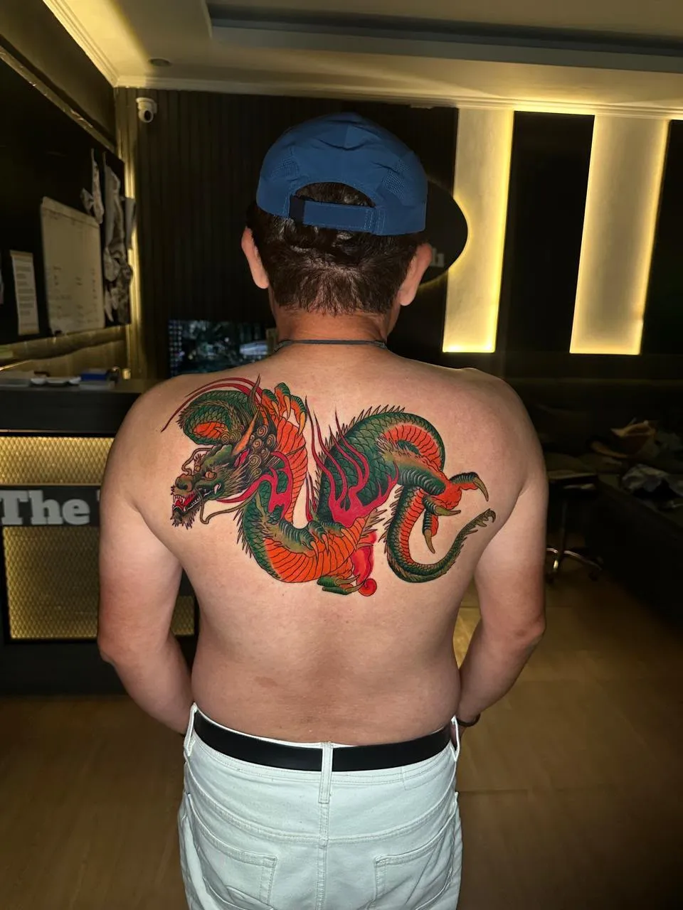 Colour Japanese dragon across the upper back, inside The True Ink Bali studio