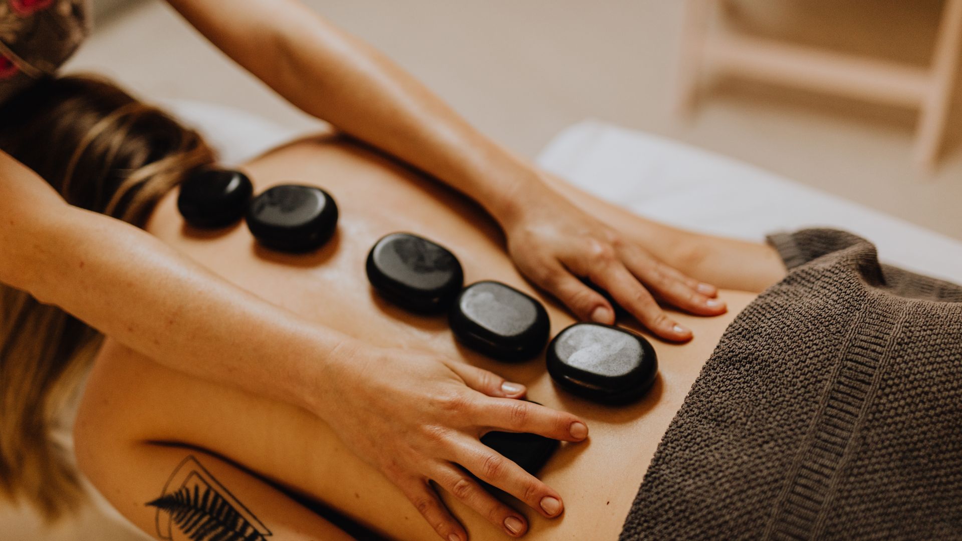 Warm stone massage therapy