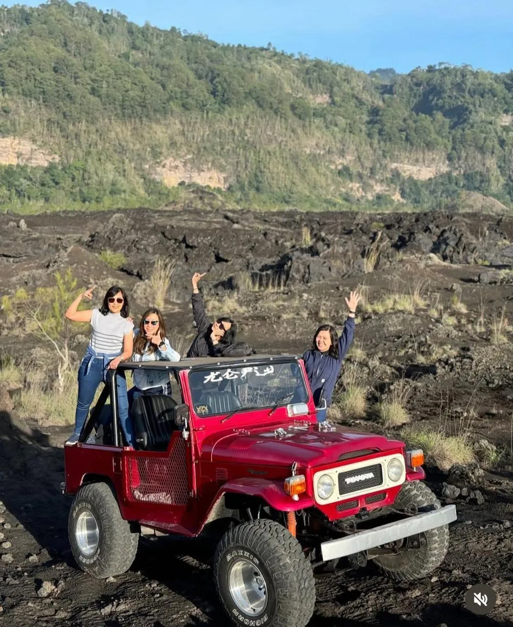 Open jeep on a volcanic slope