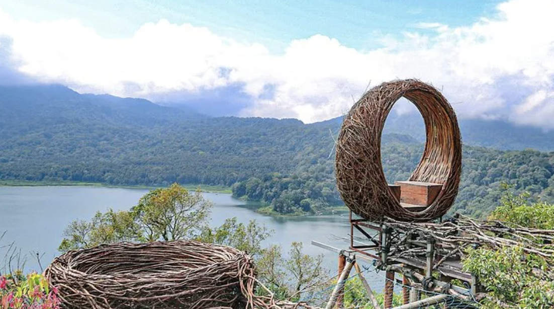 Viewpoint over a misty mountain lake in the North Bali highlands