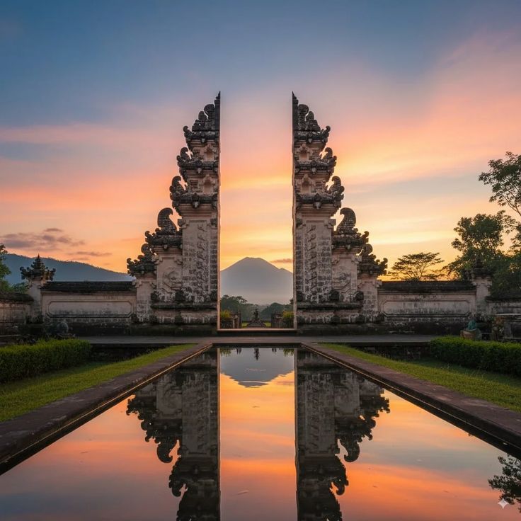 Traditional split temple gate with stone carvings in Bali