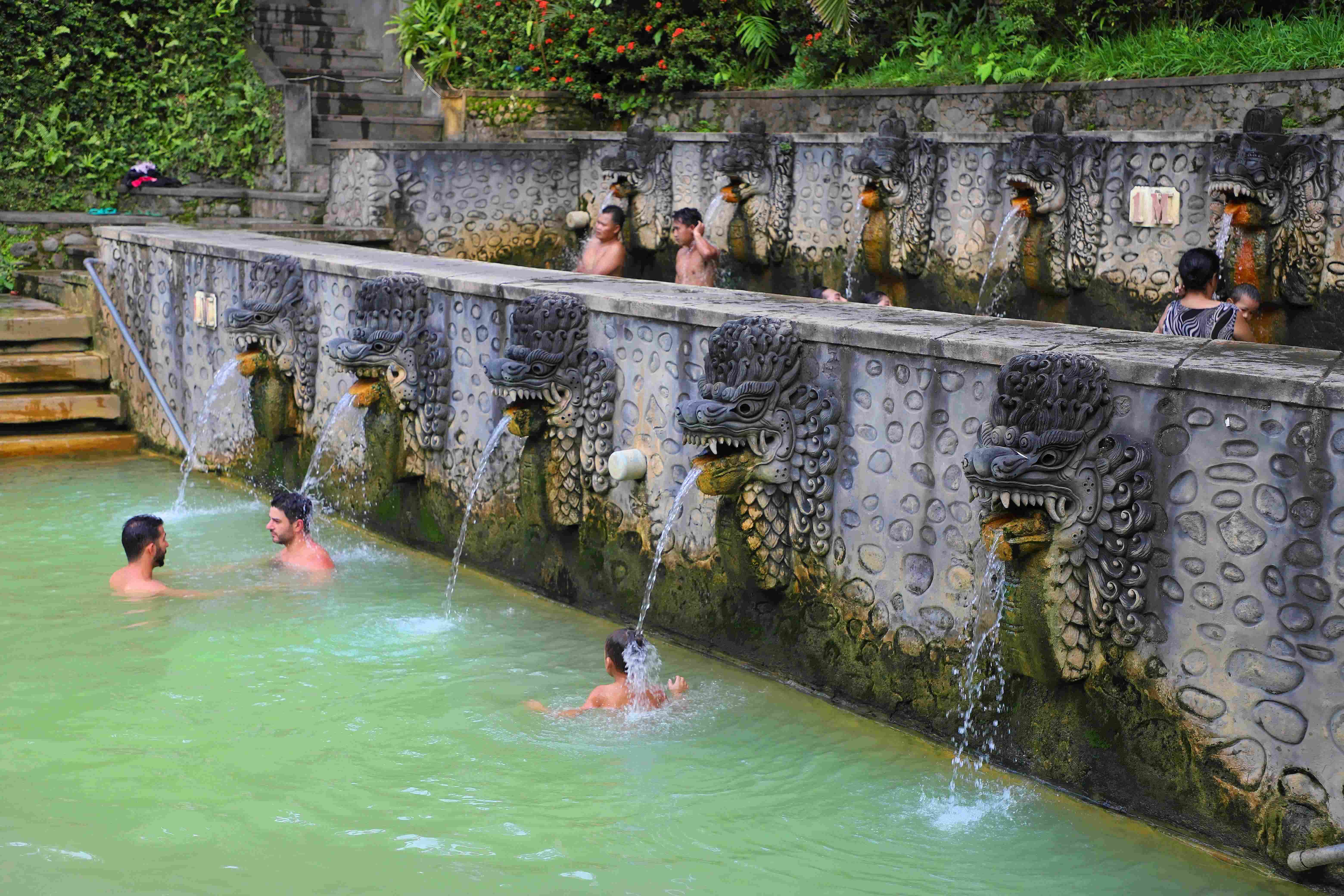 Hot spring pools surrounded by tropical greenery