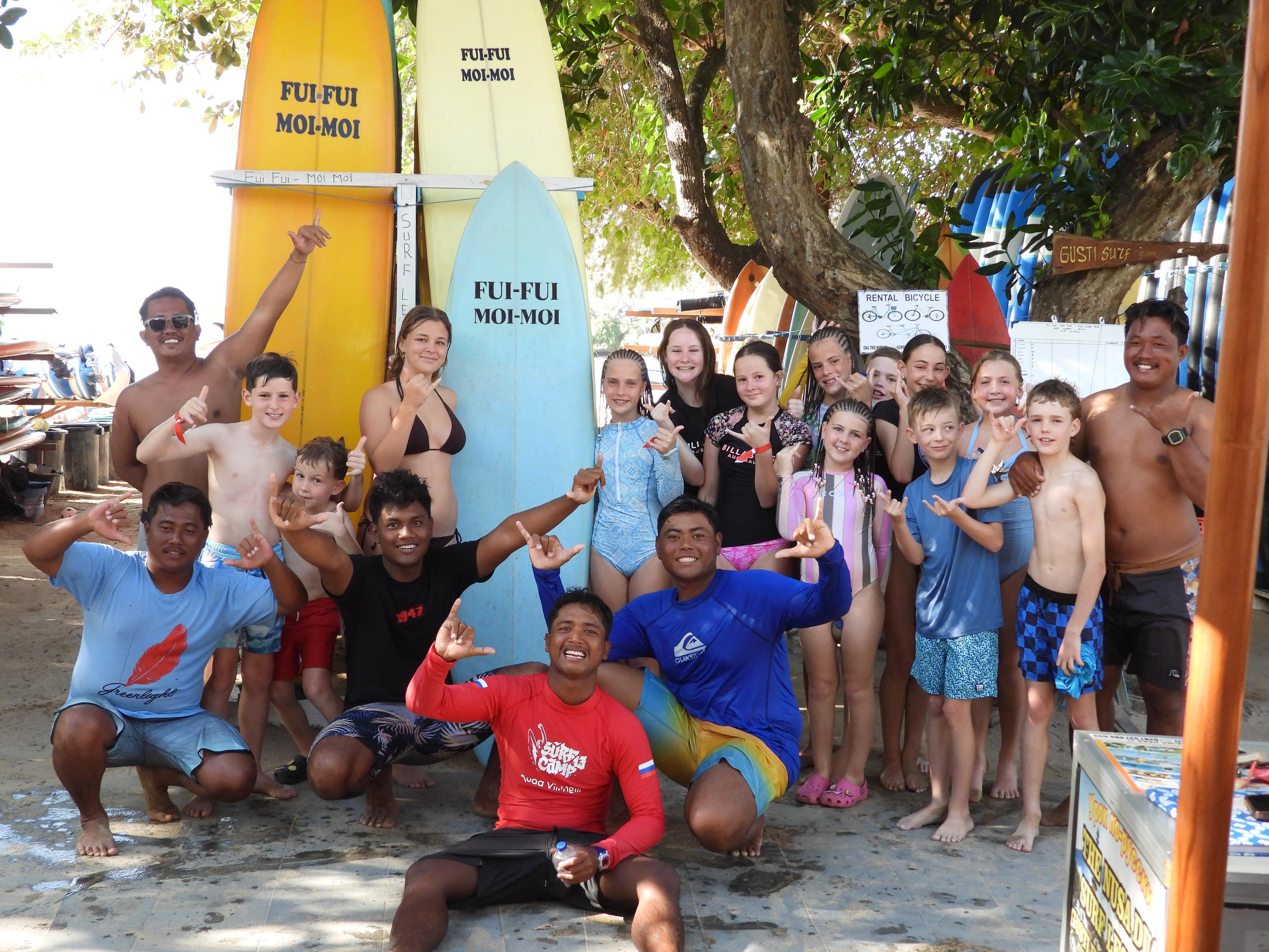 Surf instructor coaching students in Bali surf classes
