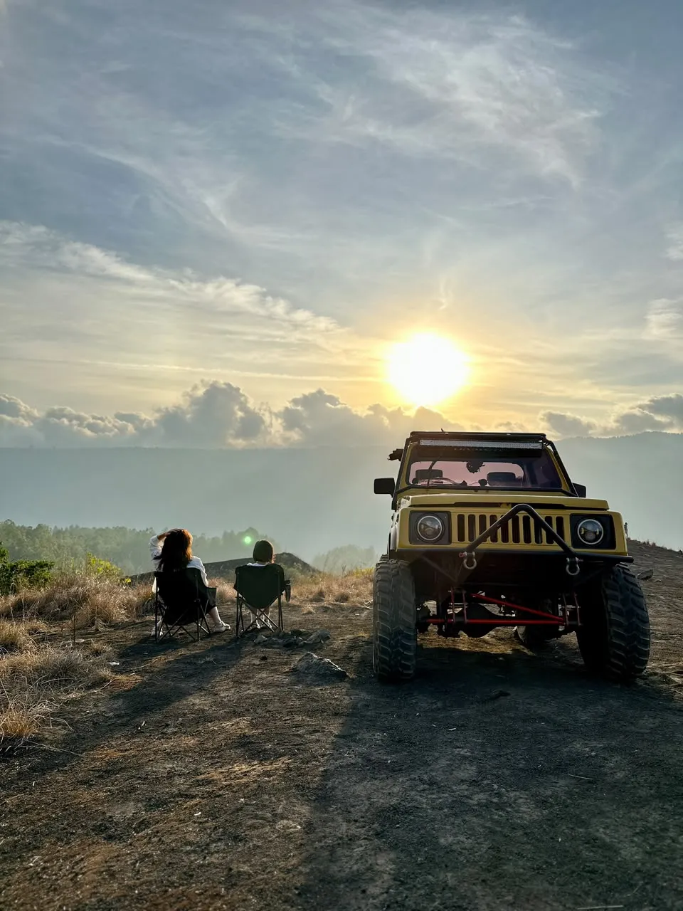 Sunset light on the black sand tour
