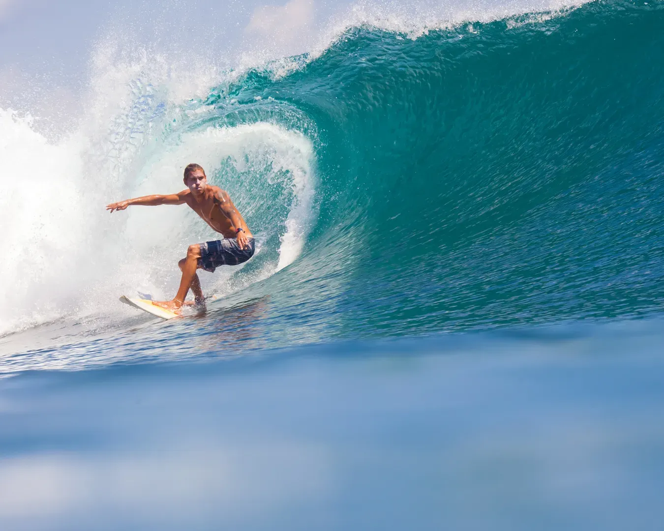 Two people surfing together