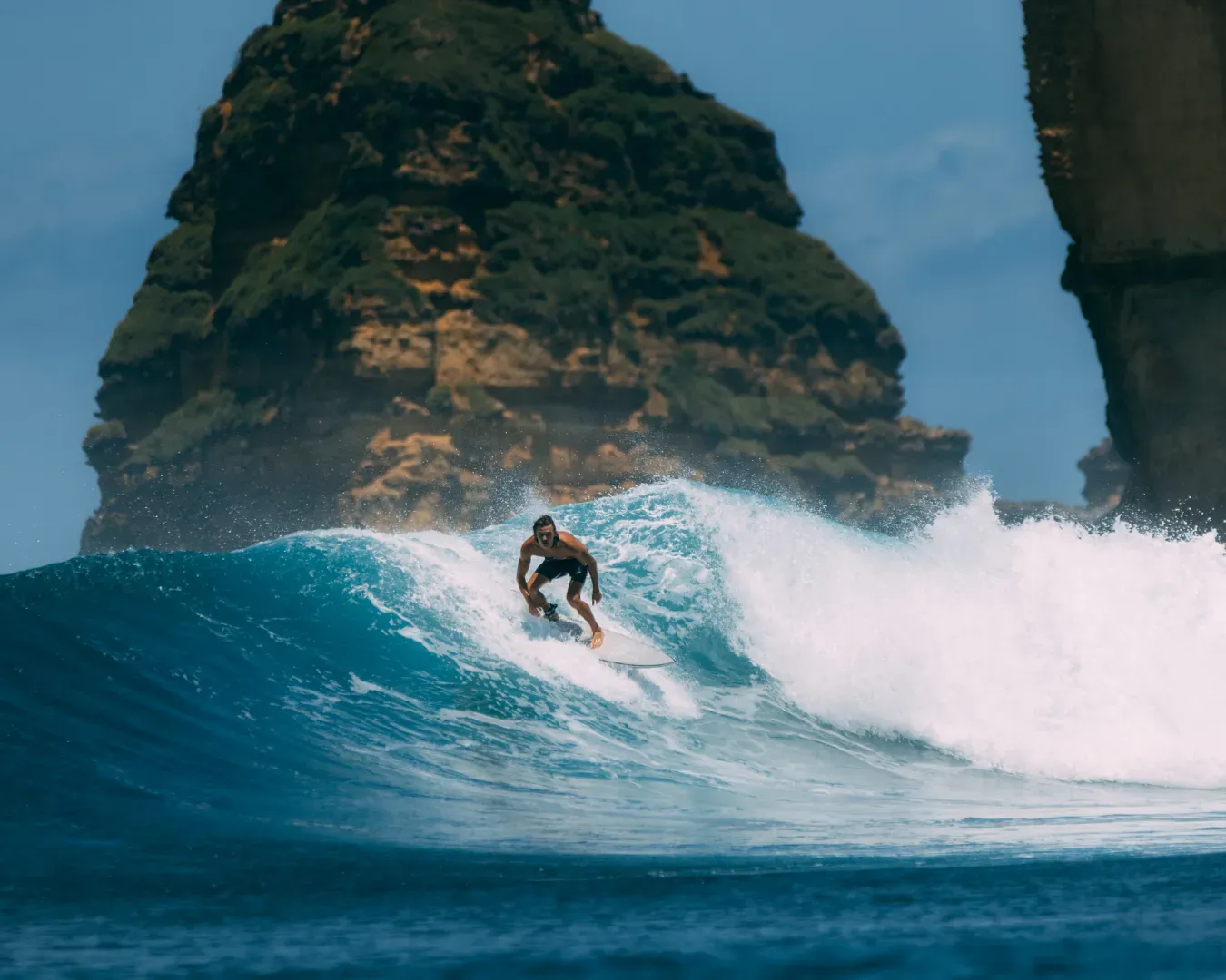 Surfer riding an ocean wave