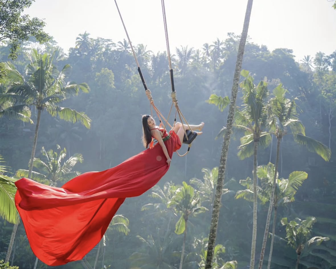 Traveler enjoying the view over Bali rice fields