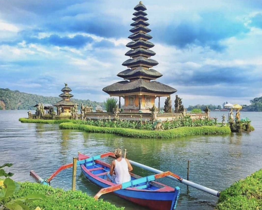 Balinese temple gate surrounded by tropical greenery