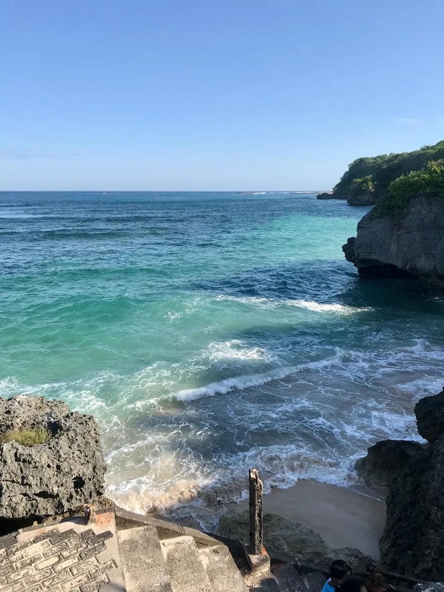 White sand and clear water at Geger Beach