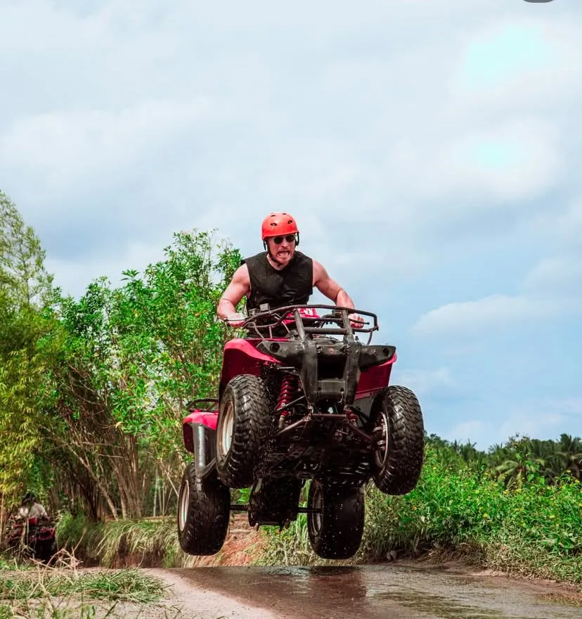 Guest jumping an ATV on a Ubud dirt track