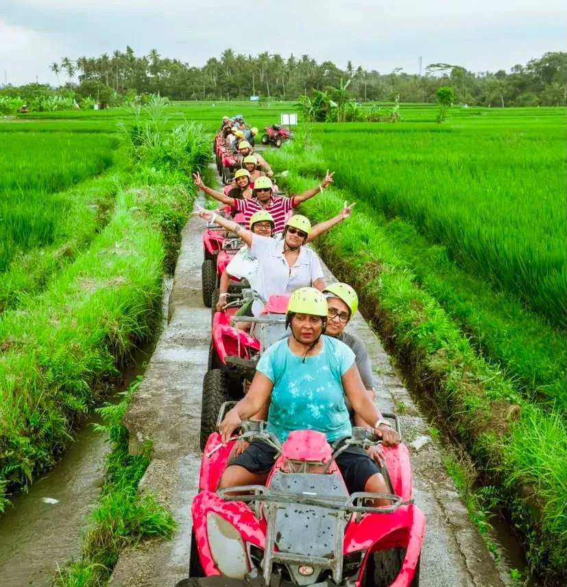 ATV convoy along a path through Ubud rice fields