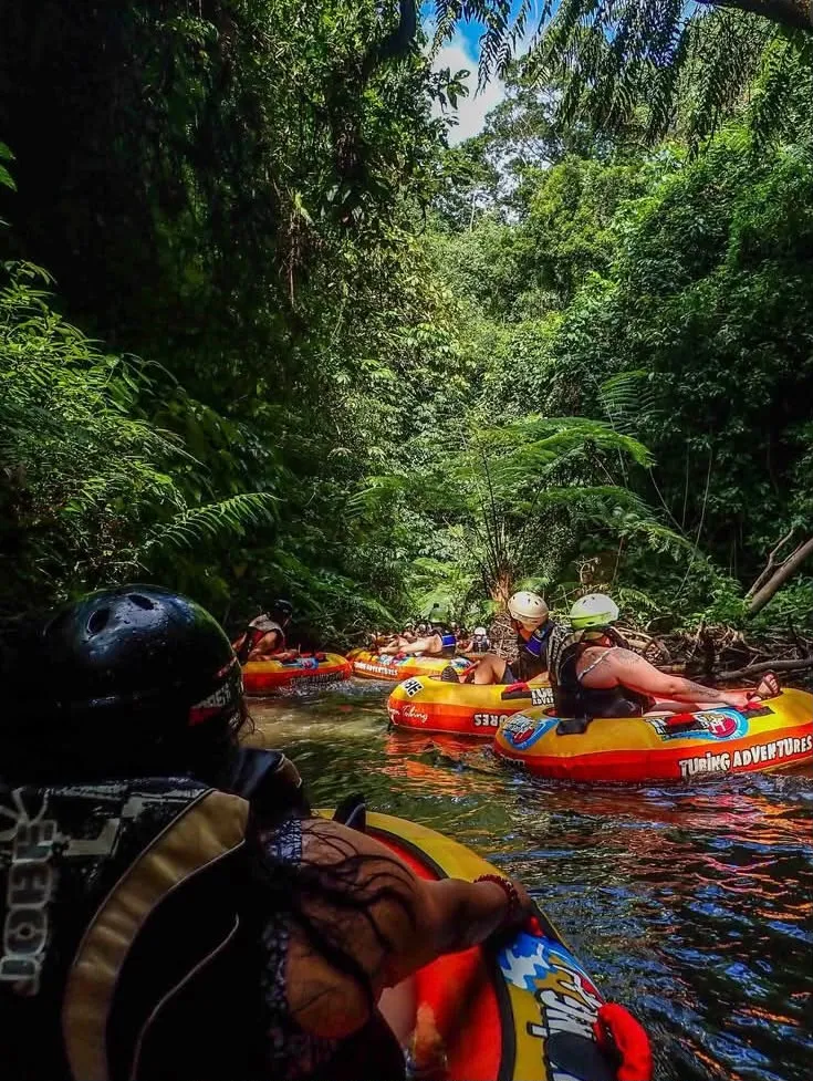 River tubing through jungle canopy near Ubud
