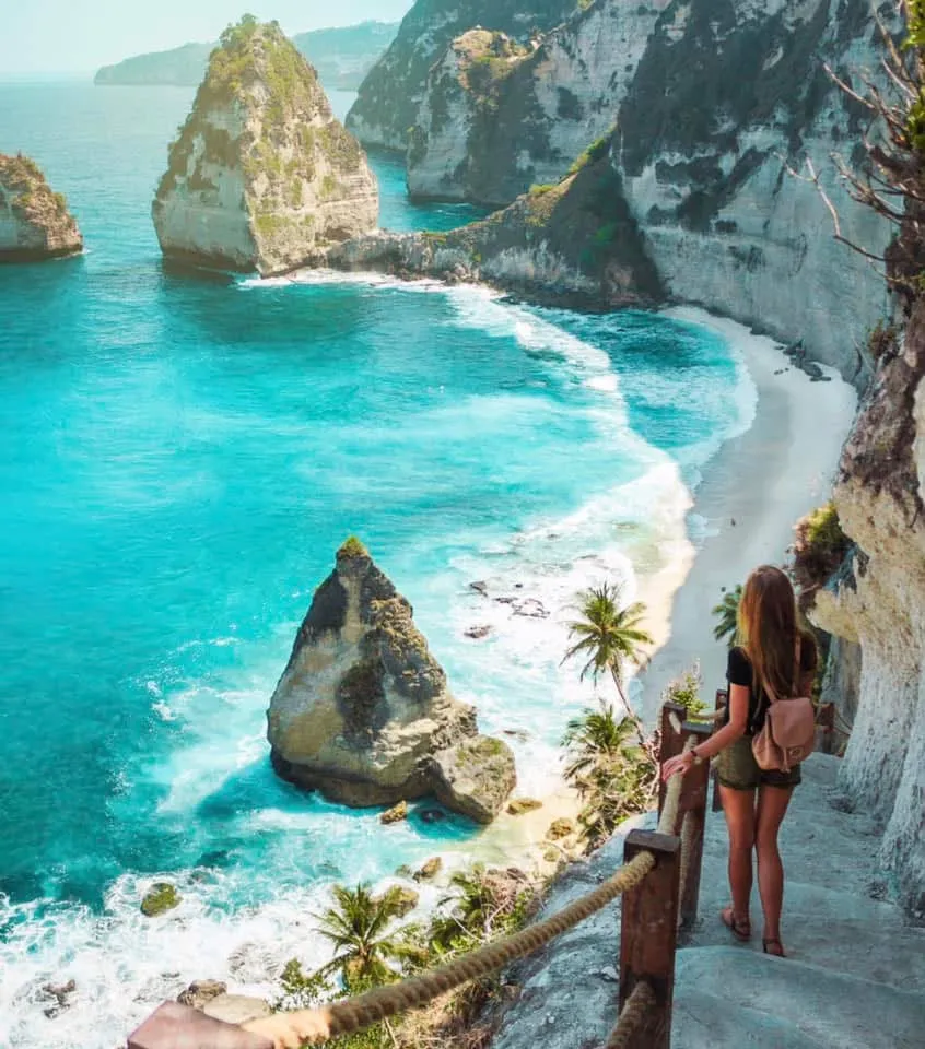 Couple at Broken Beach natural arch, Nusa Penida