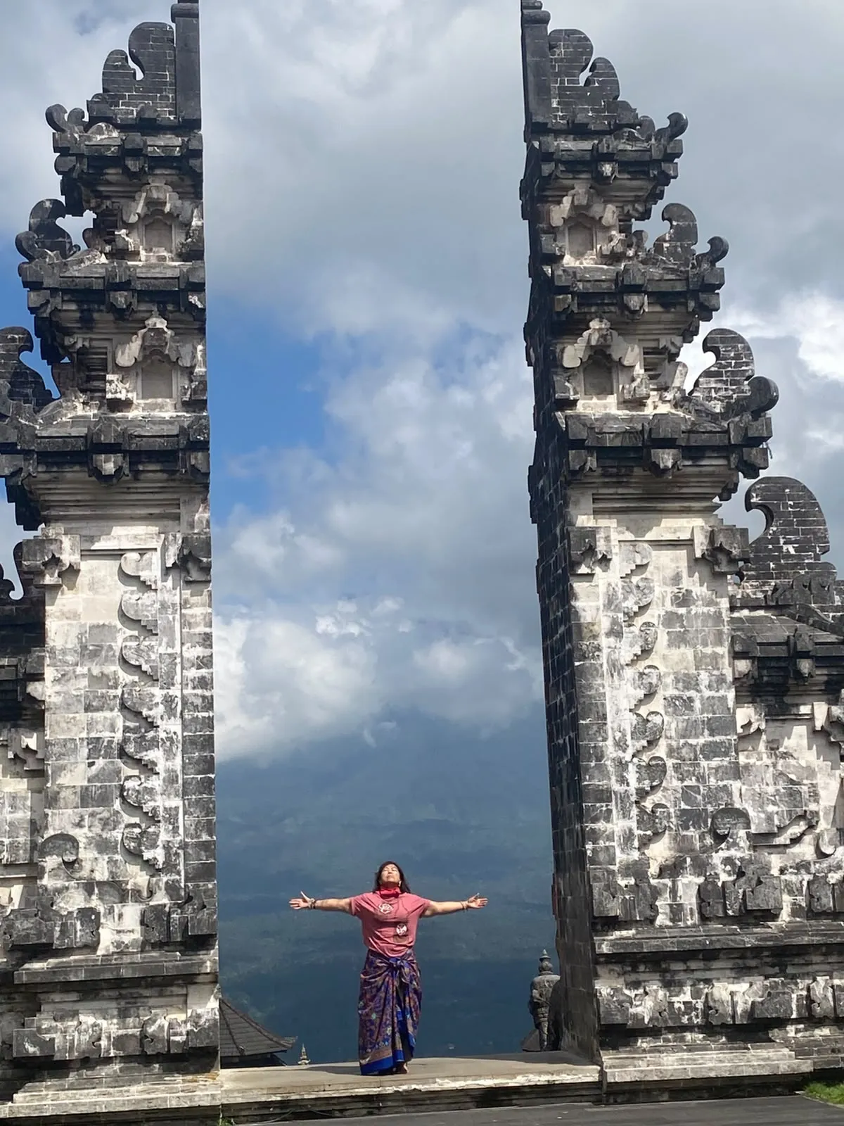 Guest standing in the Gate of Heaven at Lempuyang