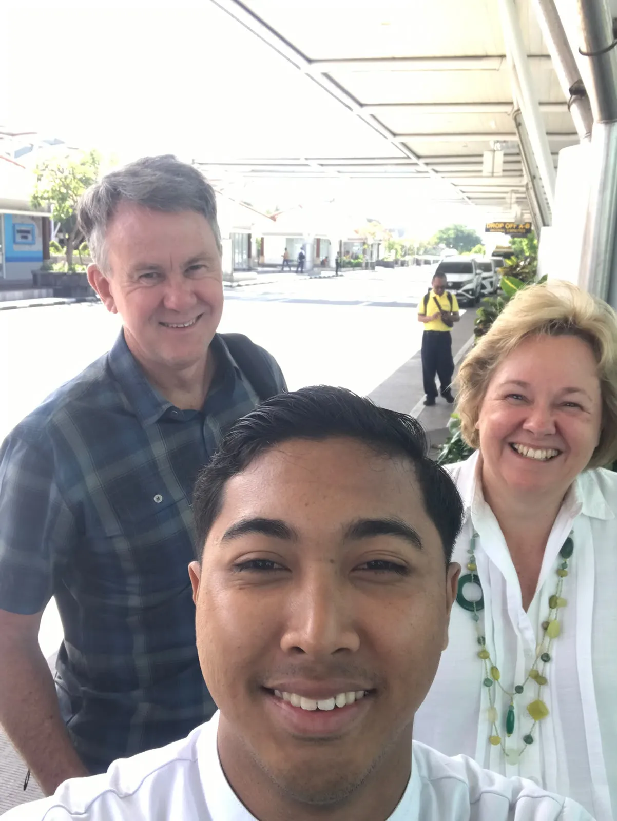 Guide meeting guests at hotel pickup in Bali