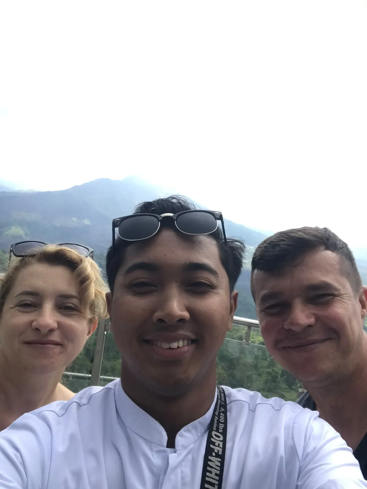 Guests and guide at a highland viewpoint in Bali