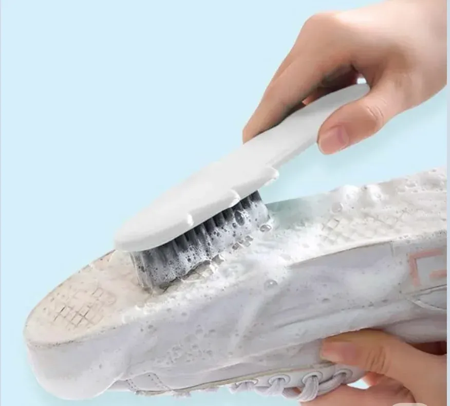 Clean white sneakers after professional shoe cleaning