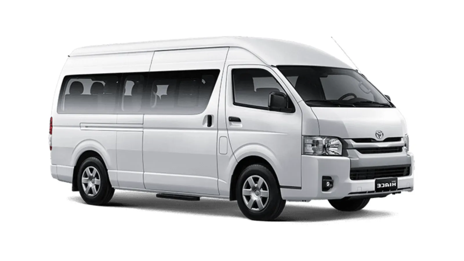 White Toyota Hiace Commuter passenger van, shown for the Toyota Hiace Commuter rental with driver