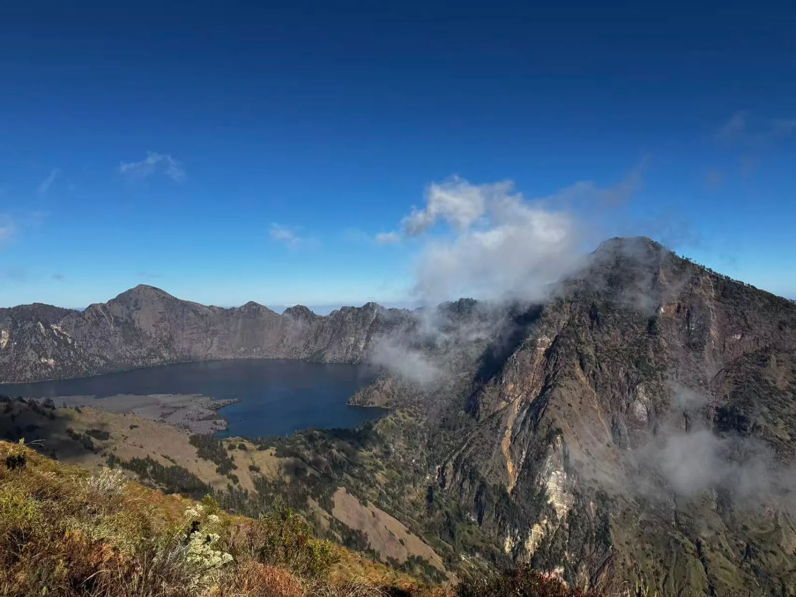 Mountain ridge above the clouds