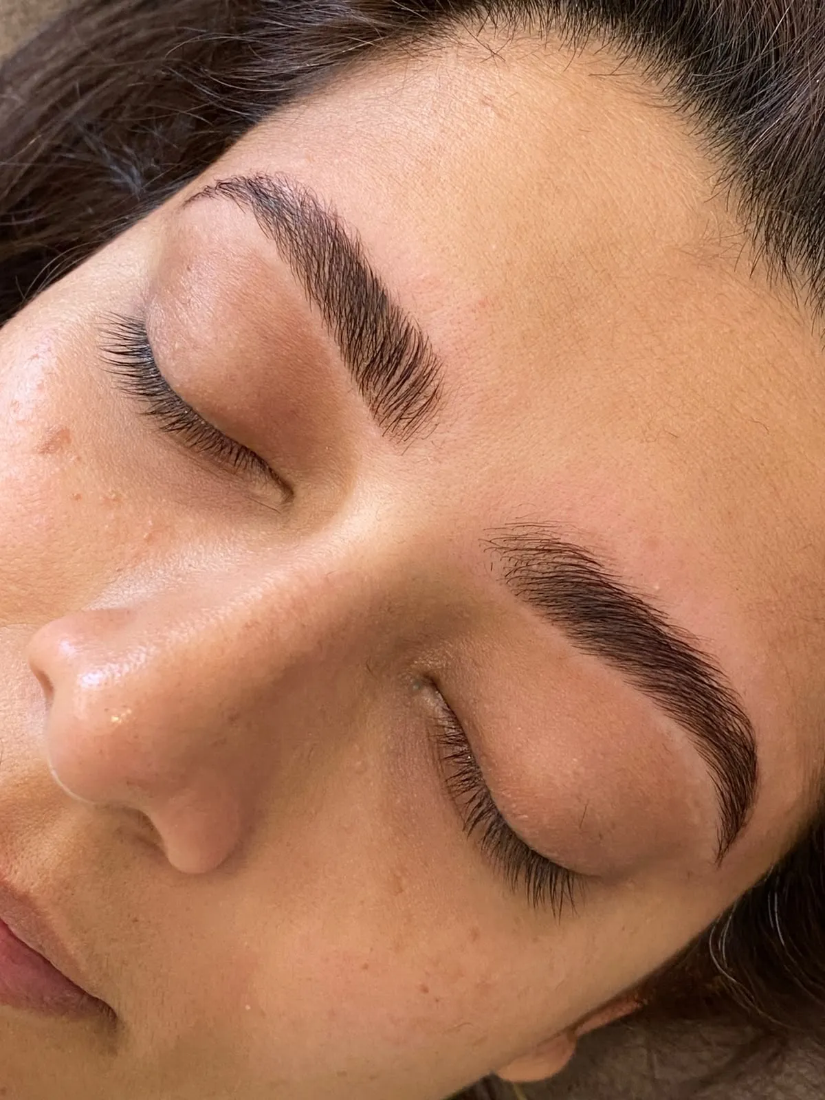 Brow makeup being applied
