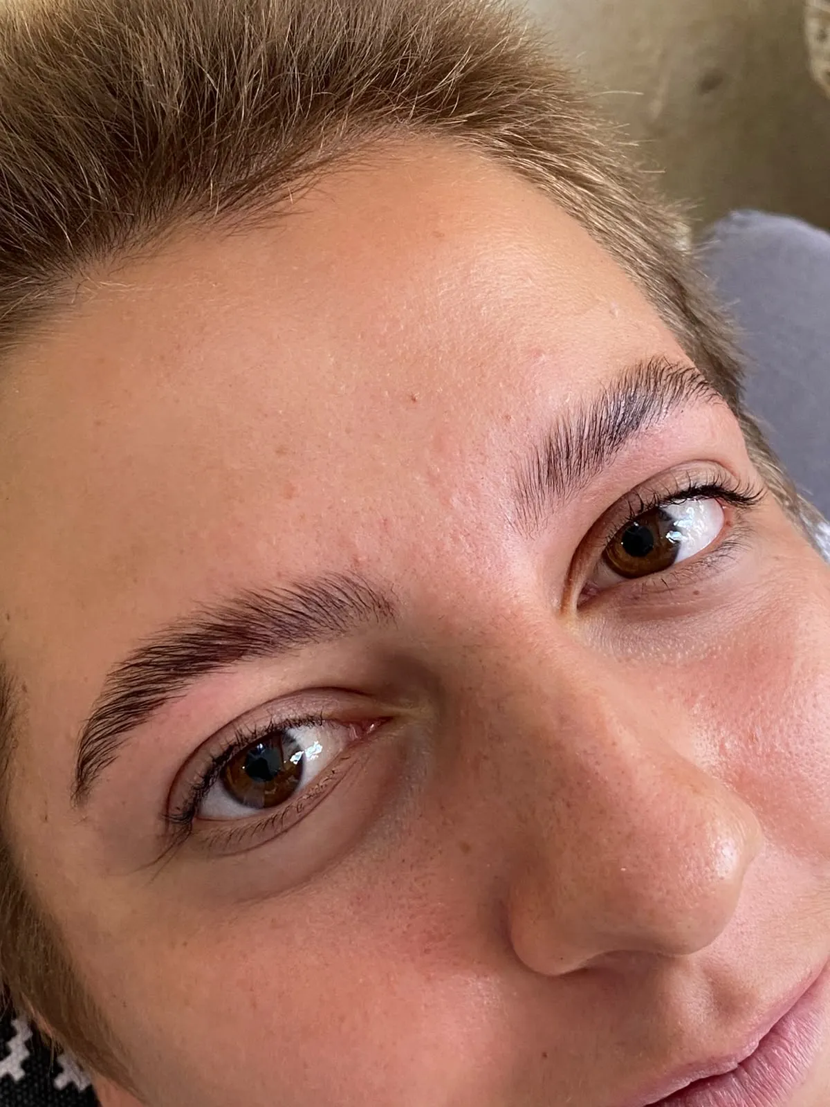 Makeup close-up at the brow chair