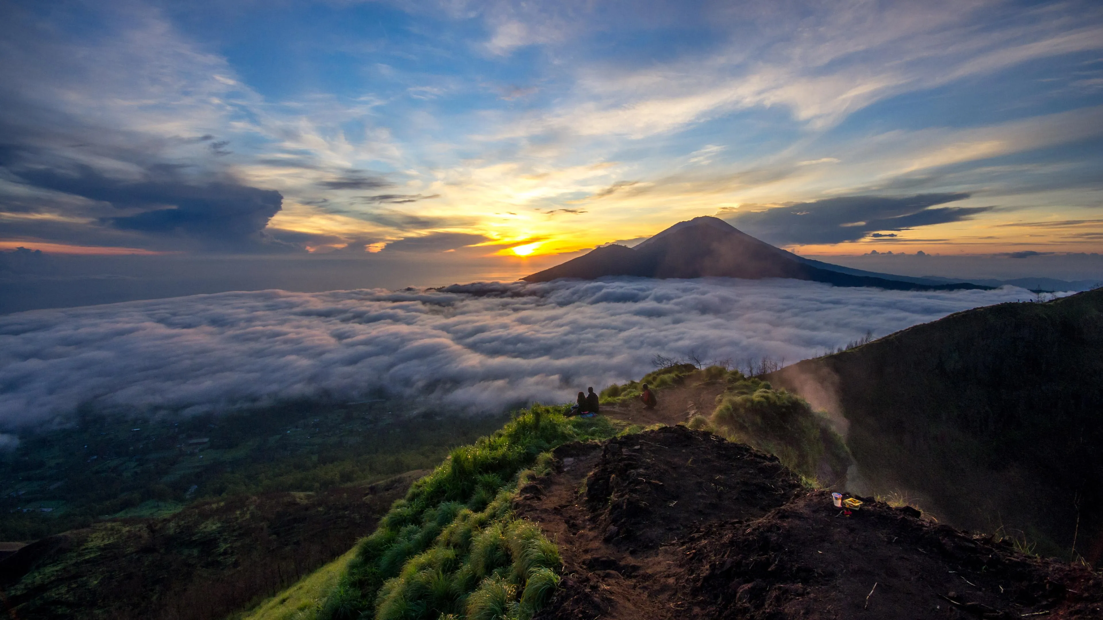 White 4WD jeep on a highland road near Mount Batur