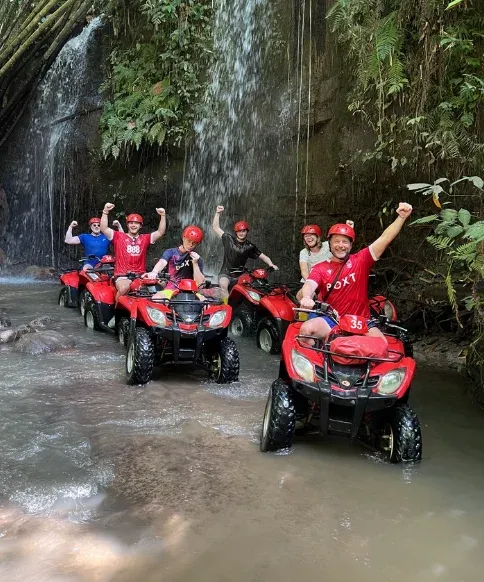 Exciting ATV quad bike trail ride through tropical jungle terrain in Bali