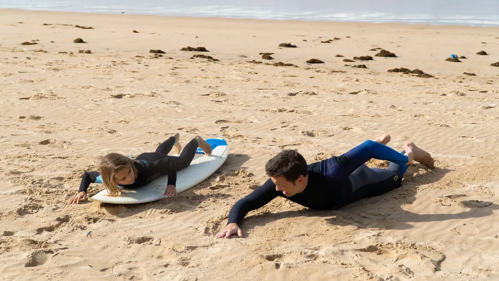 Beginner learning to surf in the ocean