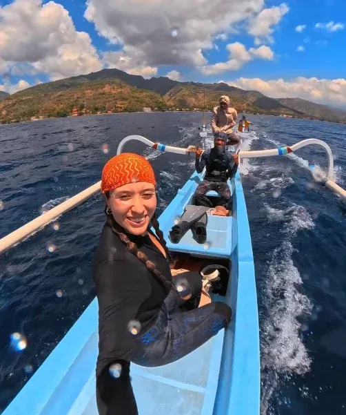 Snorkelers at the underwater temple in Jemeluk