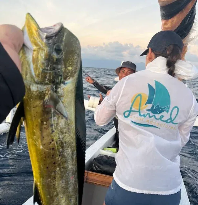 Fisherman holding a catch