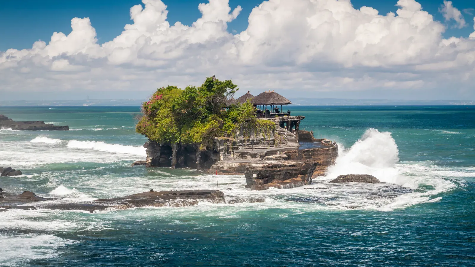 Temple gates and tropical trees in Bali